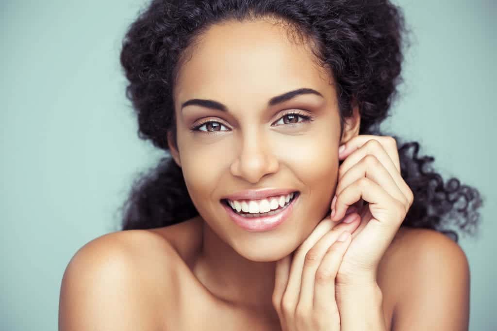 Portrait of a beautiful young African woman smiling.