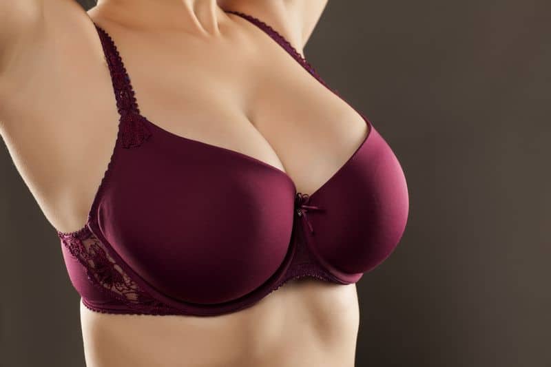Large,And,Beautiful,Women,Breasts,In,Purple,Bra